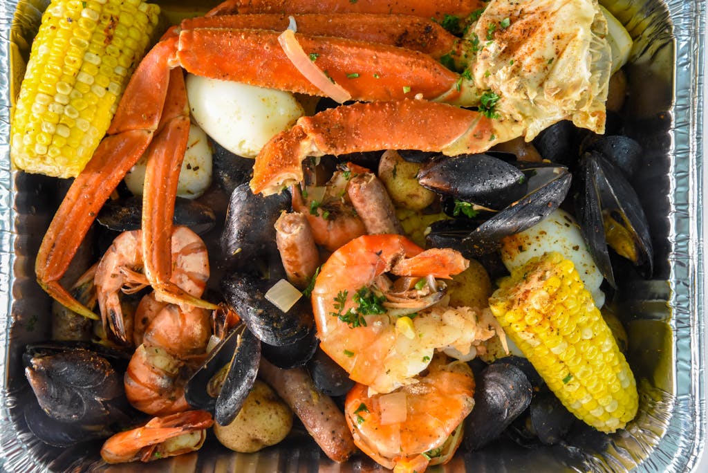 A delectable seafood boil featuring crab, shrimp, and corn, perfect for a gourmet meal.