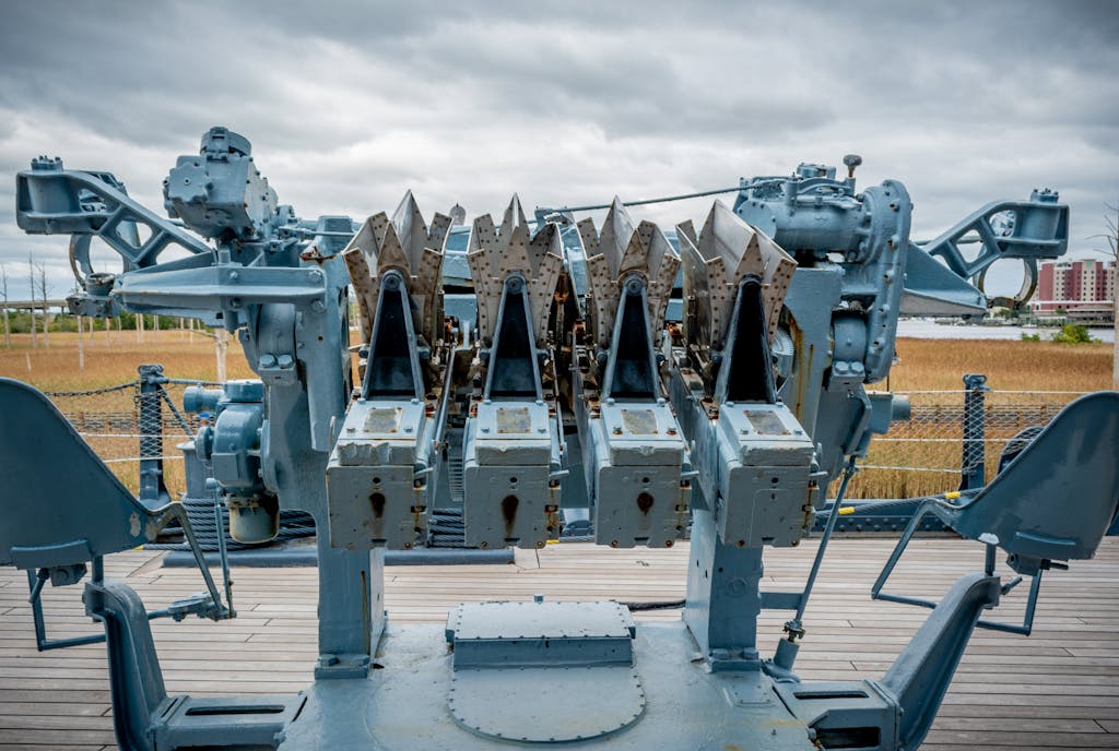 Detailed view of a naval anti-aircraft gun on a historic battleship, Wilmington, NC.