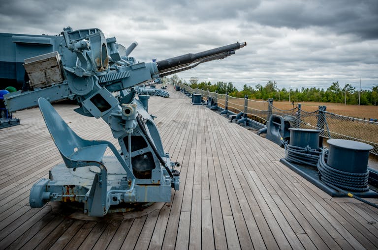 Detailed view of an old naval cannon on a battleship in Wilmington, NC.
